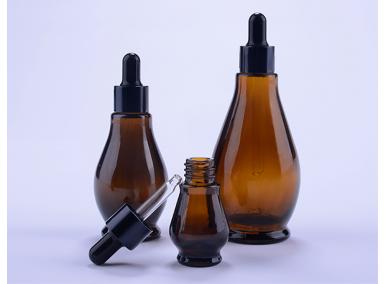 riciclaggio di bottiglie di olio essenziale