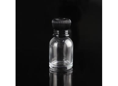bottiglie di profumo in vetro trasparente